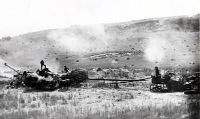 Steam engine-powered threshing scene near Colfax 1920s.