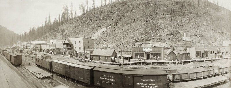 View of a small town, built along the railroad.