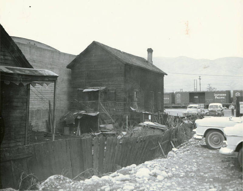 This photo is an external view of the hip sing tong, or old Chinese Masonic lodge in Lewiston, Idaho, standing next to the Beuk Aie Temple, popularly known as the Beuk Aie Miu or Joss House. The Hip Sing Tong Was Located Just North Of The Beuk Aie Miu Temple At 513 C Street (not Capital Street), And Was A Two-story Structure On The South Side Of C Street, Between Third And 4th Streets, Relocating To This Location Around 1890.