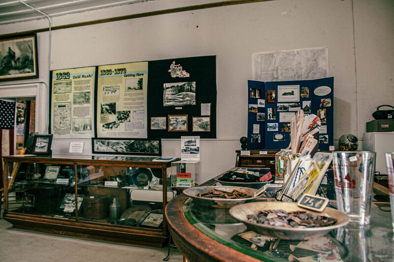 Inside of the Boise Basin Museum depicting artifacts and posters.