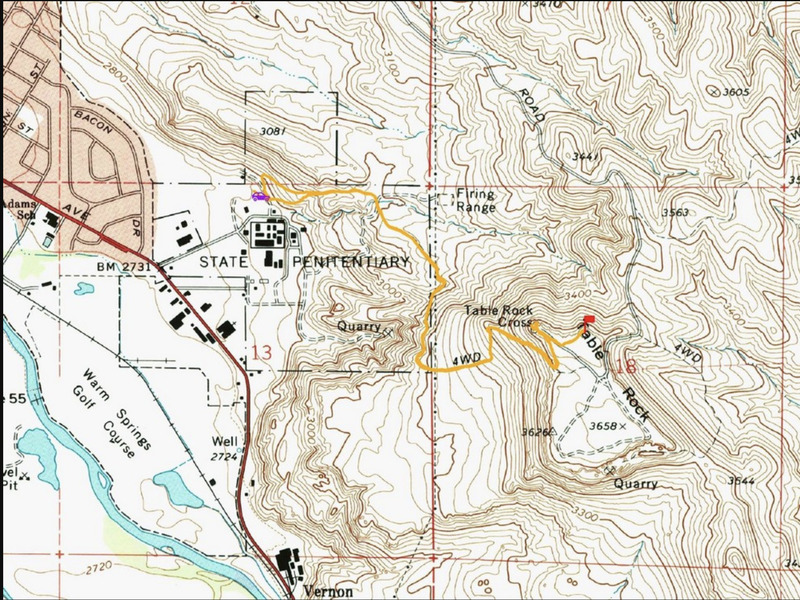 The topographic map illustrates the Table Rock Plateau, with the location of the cross marked, and shows the surrounding environment and structures.