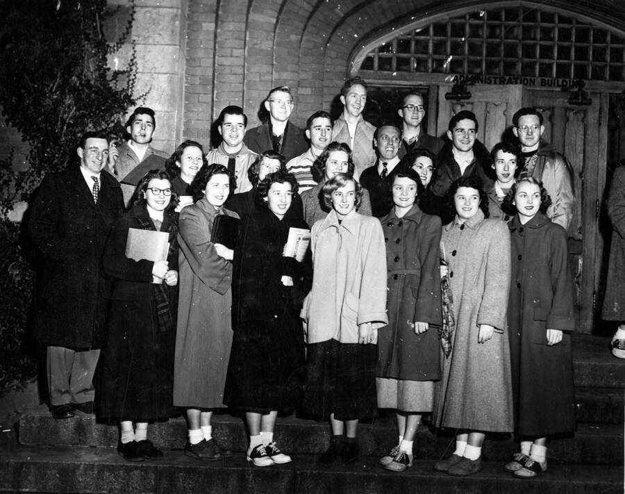 Photograph of the Vandaleers standing outside the Administration Building.