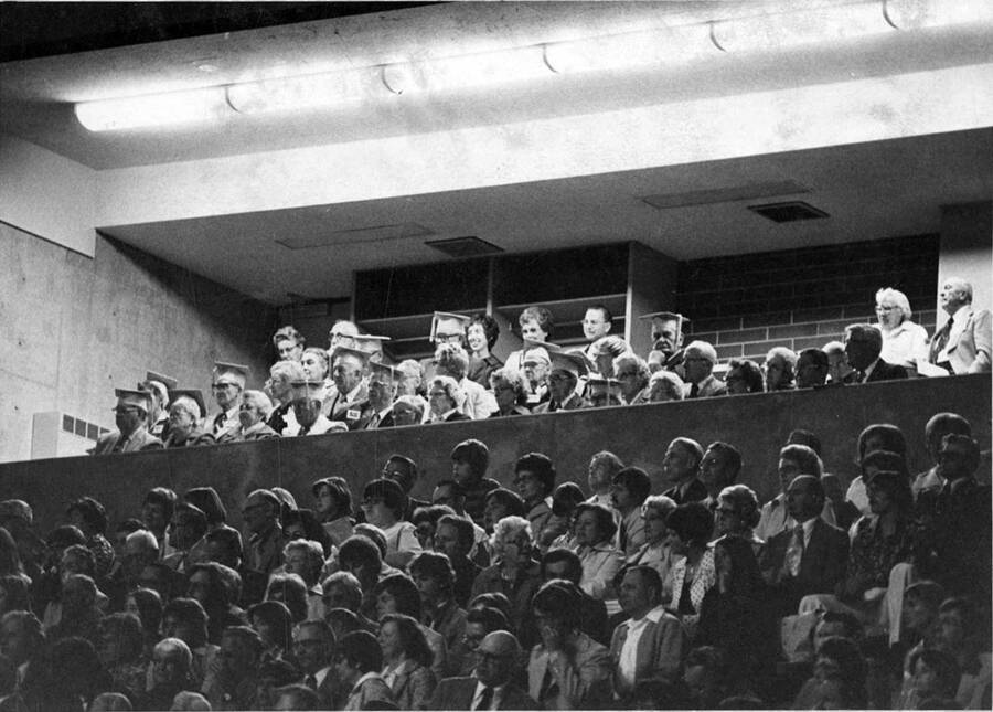 The graduates of the class of 1927 sit in the box seats of the Kibbie Dome at Commencement. Also shown is Vandal Booster President Bob Jackson and his wife, Irma.