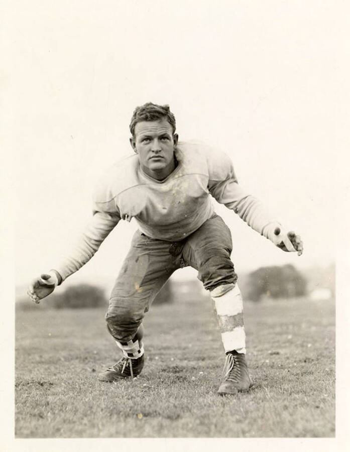 Action shot of University of Idaho football player Rex Workman.