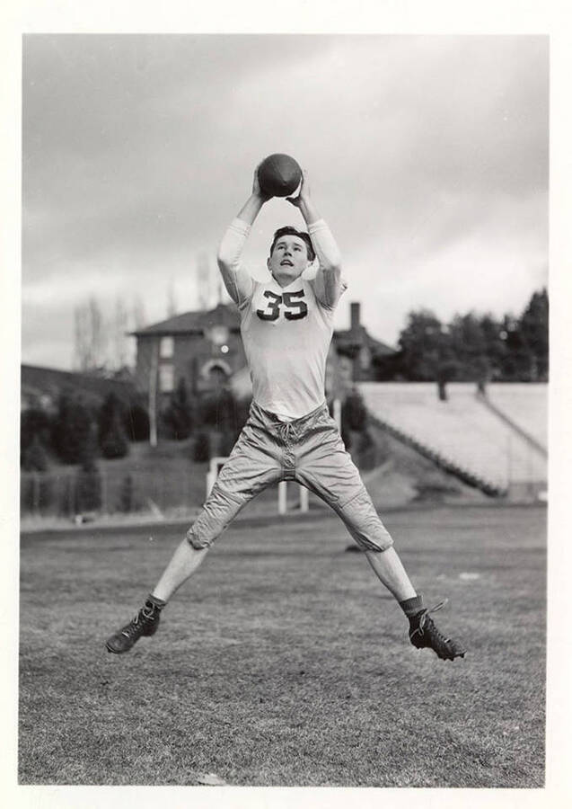 Action shot of freshman football player for the University of Idaho, #35 John Evans.