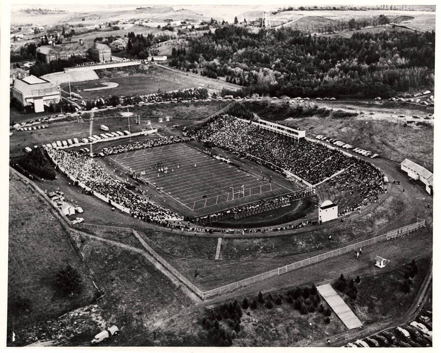 Aerial view of Neale Stadium during a football game between the University of Idaho and  Washington State College. The game was won by Washington State College 0-7.