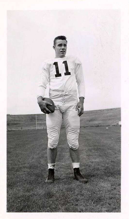 Freshman football player for the University of Idaho Phillip 'Flip' Kleffner (#11), standing.