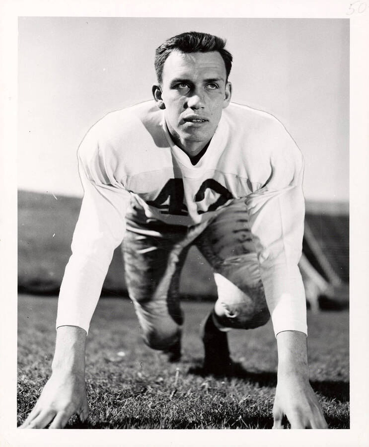 University of Idaho football player #42 crouching on the field.