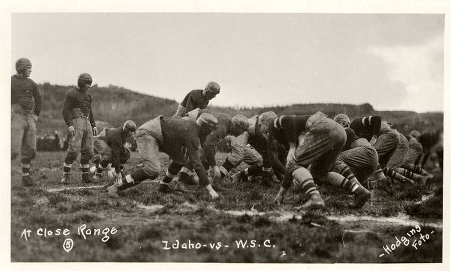 Players line up before play begins during the University of Idaho versus Washington State College football game.