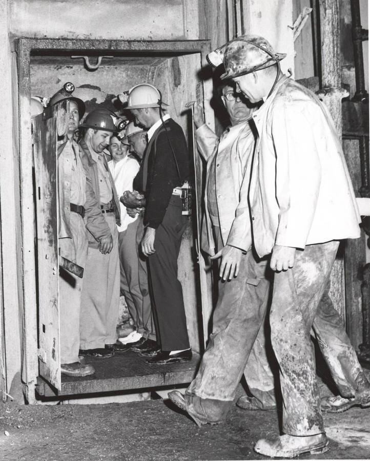 Students attending the tour of the Lucky Friday Silver-lead mine at Mullan enter the lift to the mine.