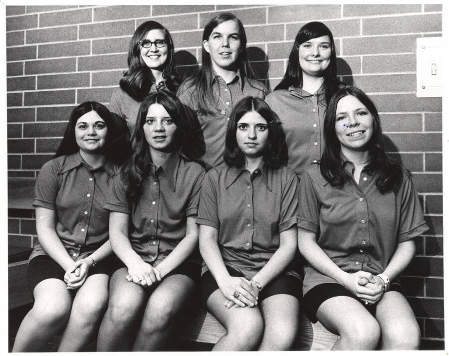 The Women's Recreation Association bowling team poses for a group photo. Individuals identified as listed. Front row: Nancy Dick, Jill Ragan, Becky Meserole(?) and Sue Peterson. Back row: Nancy Nyenhaus, Doris Albcots(?) and Sue Spivey.