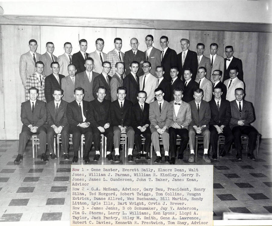 Sigma Tau members pose for a group photo. Individuals identified as listed, left to right, front to back. Simga Tau is the National Honorary Engineering fraternity.