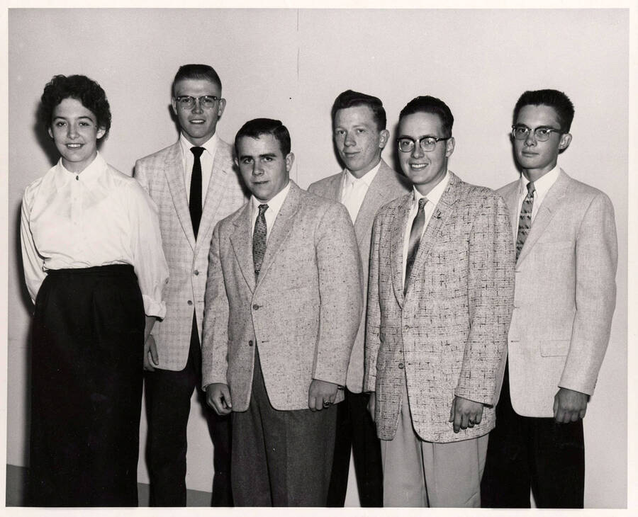 Dairy industry association scholarship recipients pose for a group picture. Individuals identified from left to right: Janet Hacking, Denton C. Darrington, Roy Louis Karnes, Douglas L. Park, Willard Michael Sullivan and Jerome E. Jankowski
