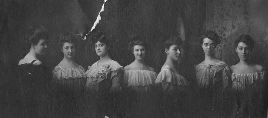 A group photo of the members of Alpha Delta Pi, circa 1903, which became Gamma Phi Beta in 1910. From left to right: Margaret Henderson, Melta Beatrice Dunbar, Christina Almaya Playfair, Rebekah Pearle Thickstrom, Florence May Zemhof, Lucile Mary Mix, Myra Irene Moody, Abbie Mix, Georgia Ethell Moody, Lara May Forney, Edna Mabel Wahl.