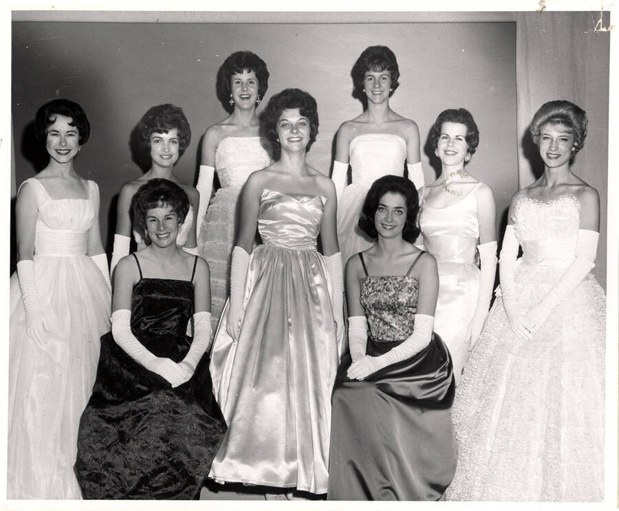 Miss University of Idaho candidates pose together for a picture. Individuals identified as listed. Front (left to right): Katherine Baxter, Joannie Myers. Middle (left to right): Irene Bishop, Camille Johnson, Patricia Folz, Bette Vickerman, Karen Sue Drowns. Back (left to right): Nancy Kaufmann, Carol McCrea