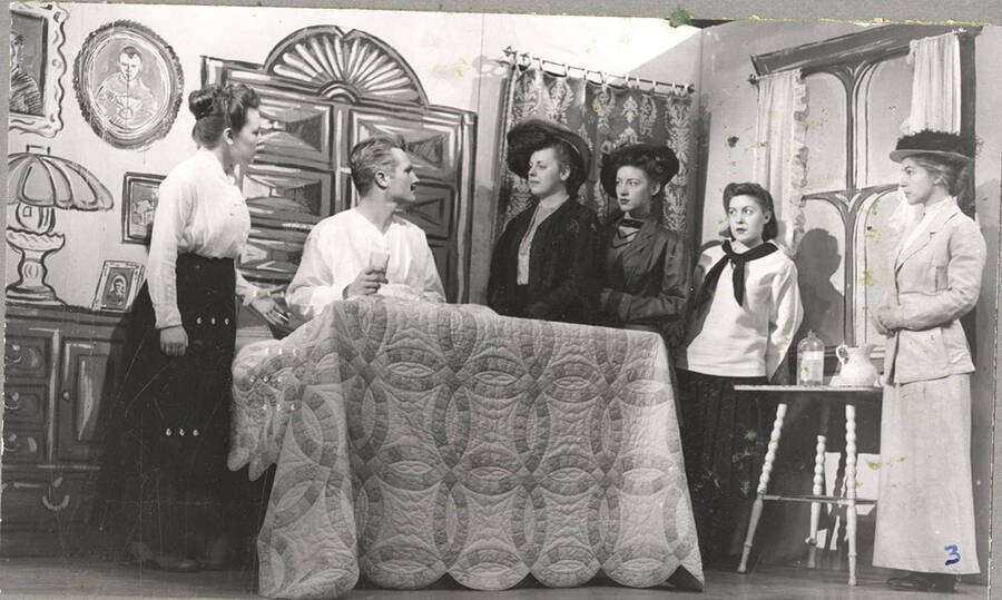 From l-r: Marjorie Dean as Mama, Otis Walter as Uncle Chris, Margaret Payne as Aunt Jenny, Nancy Smith as Aunt Sigrid, Darlene Henderson as Katrin and Lillian Bowler as Aunt Trina. The conversation between the family acted out in Idaho drama's production of 'I Remember Mama.'