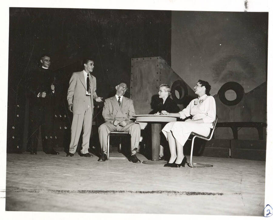 Performers from l-r: Guy Terwilleger as Rev. William Duke, Kenneth Goldsberry as Mr. Prior, Morton Grinker as Mr. Lingley, Larraine Cole as Mrs. Midget, Shirley Banning as Mrs. Cleveden Banks. The characters laugh at a table in Idaho drama's production of 'Outward Bound.'