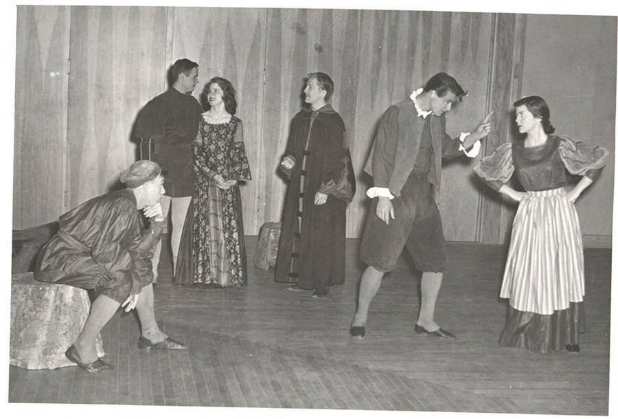Students from l-r: Ron Baker, Paul Matthews, Beverly Alger, Frank Miles, Larry Hyer, Sharon Henderson. Idaho drama students act out a group scene in the department's production of the play, 'The Doctor In Spite of Himself.'