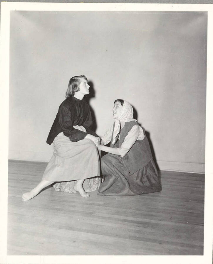 Joan Ferris and Myra Bergman perform as Mengette and Jeanne during the University of Idaho's production of "A Maid Goes Forth to War" during a summer drama workshop.