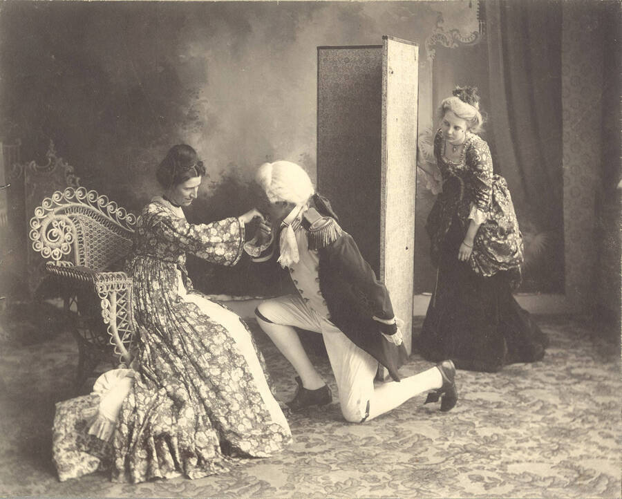 Edna Moore as Lydia Languish, Homer David as Captain Absolute and Edna Clayton as Mrs. Malaprop in Idaho drama's production of "The Rivals."