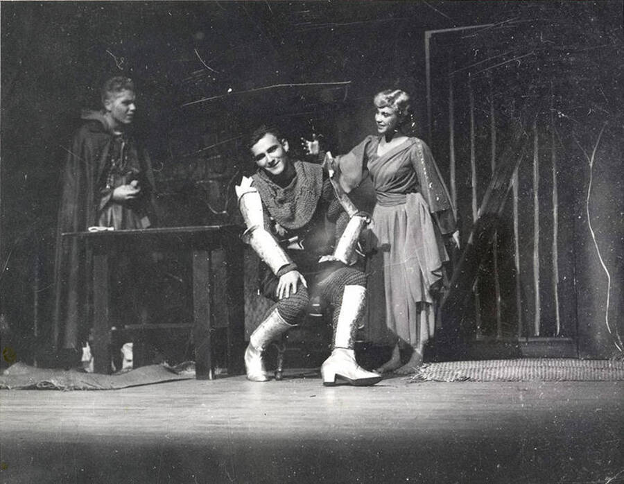 James Heer, Austin Bergin, and Diane Kail perform a group scene together during a drama production of 'Ondine'.