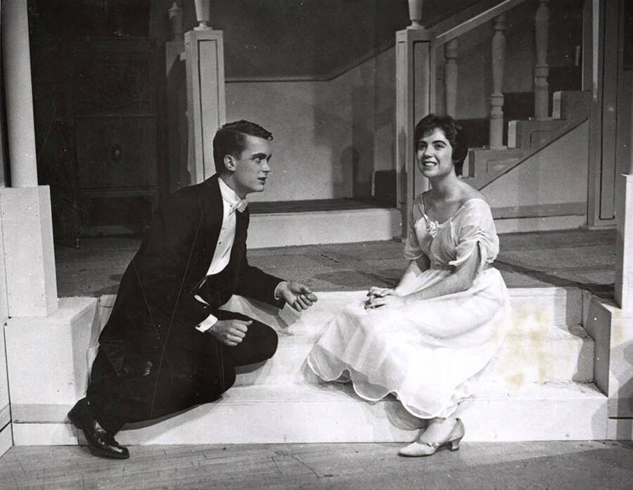 Sam Collet and Diane Kail perform together on stage during a drama production of 'The Happiest Millionaire'.