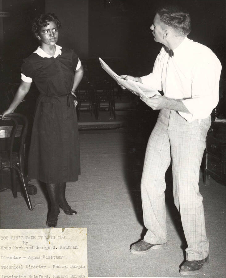 Antoinette Botsford and Howard Dorgan performing together on stage during a drama production of 'You Can't Take It With You'.