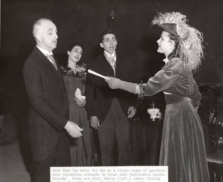 Cecil Matson, Mary Ellen Bennett, Gary Nefzger and Maizie Hill perform together during a drama production of 'Lady Windemere's Fan'. A caption reads 'Here that fan saves the day as a clever woman of questionable reputation attempts to break into fashionable London Society. Shown are Cecil Matson (left.) summer faculty ...'