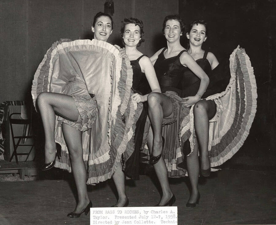 Directed by Jean Collette. A group of dancers posing for a picture.