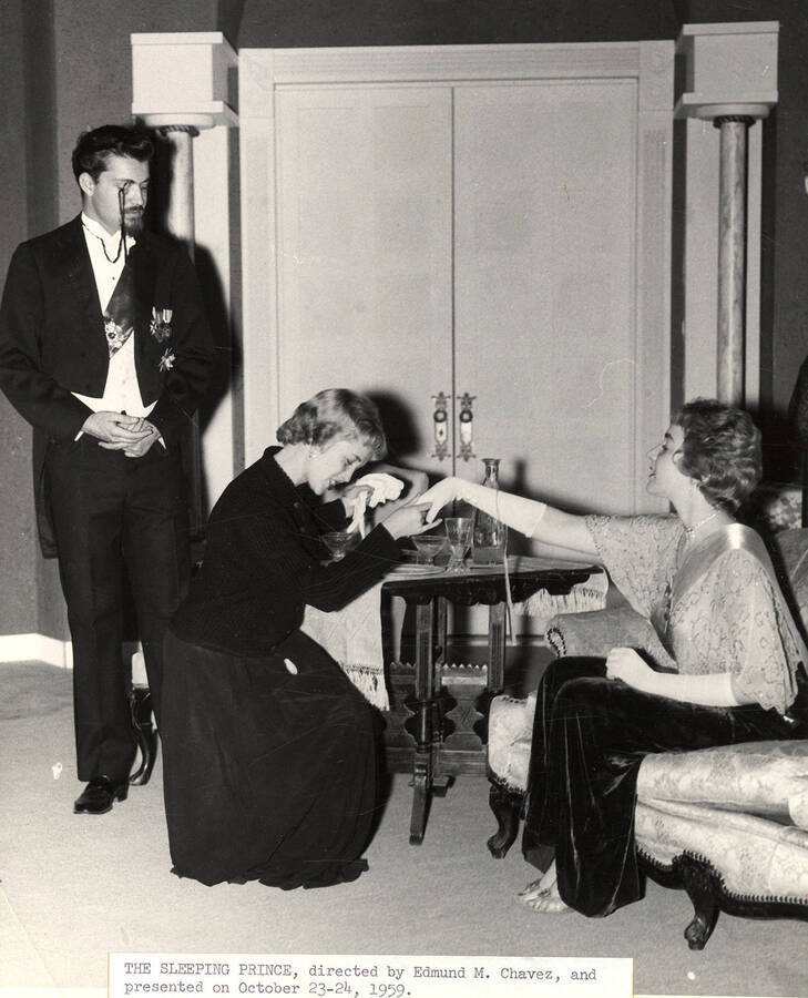 L-r: Edgar Vandevort, JoAnne O'Donnell and Sally Wilbanks. A woman admiring another woman's hand and a man observing.