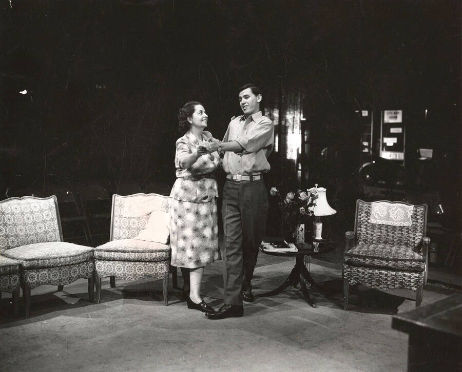 Georgette Amos performing as mother and Walter Brennan as her son