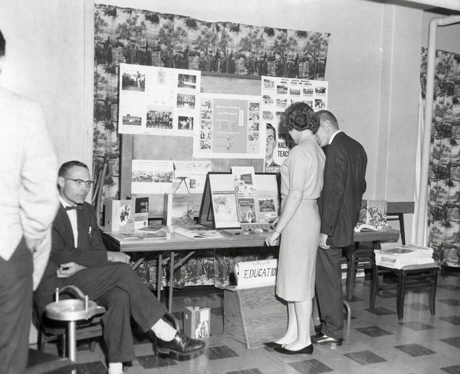 Students look at the College of Engineering display in the Lobby and Information Center during the open house after the completion of a third addition to the Student Union Building.