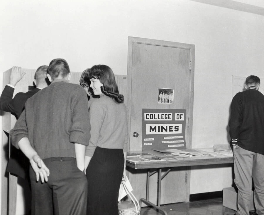 Students look at the College of Mines display in the Lobby and Information Center during the open house after the completion of a third addition to the Student Union Building.