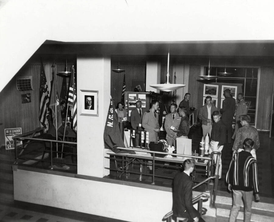 Students look at the U.S. Marines and Navy display in the Lobby and Information Center during the open house after completion of the third addition to the Student Union Building.