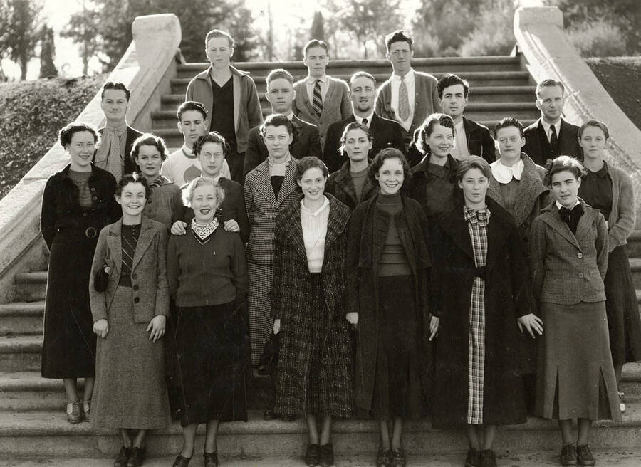 A group of second-generation University of Idaho students stand on the steps.