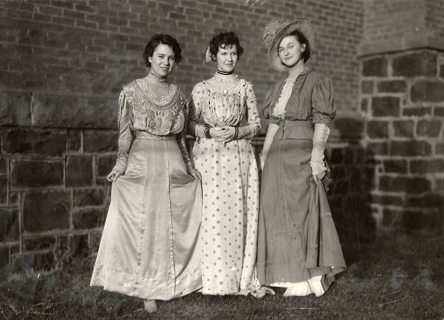 University of Idaho students Edith Slatter, Jean Kingsbury and Nina Varian pose in early 20th-century period costumes.