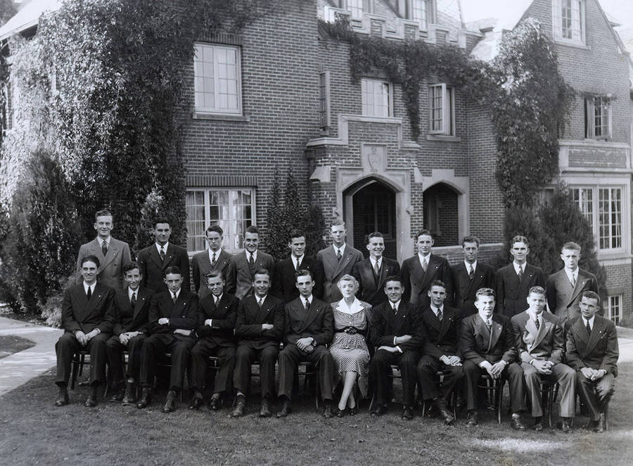 Group picture outside the Beta Theta Phi house, located on the northwest corner of Idaho and Elm Streets.