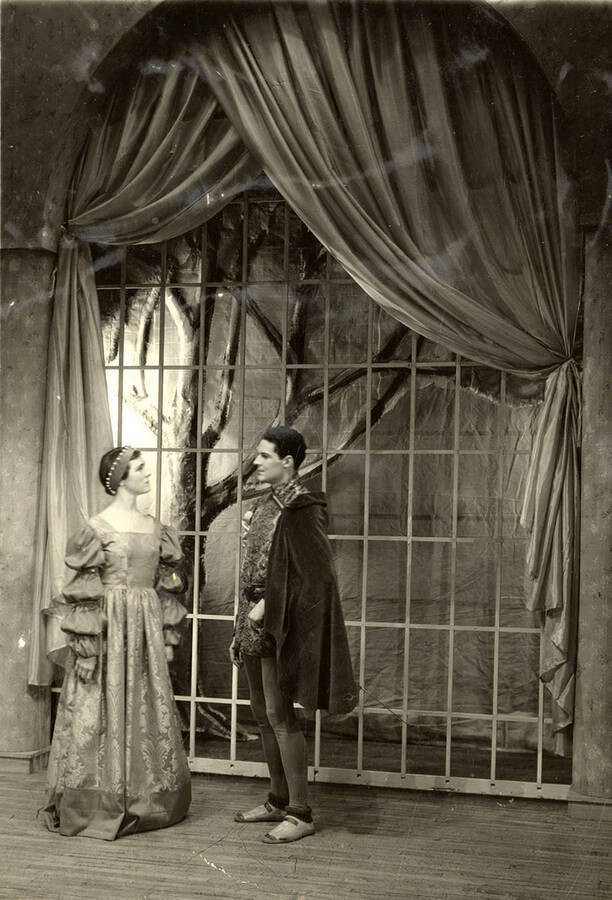 Scene from the University of Idaho drama production of 'Much Ado About Nothing.' Beatrice as Catherine Brandt (left) and Benedict as Clayne Robison (right) can be seen dressed in costume and talking with each other.