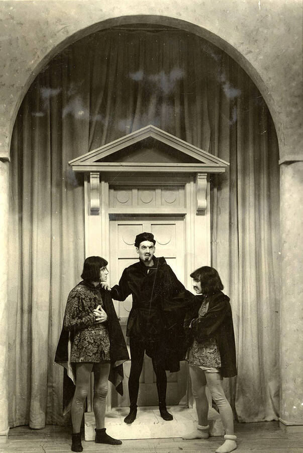 Scene from the University of Idaho drama production of 'Much Ado About Nothing.' In this scene, three dyed-in-the-wool villains played by Casady Taylor, Earl Bopp and Lloyd Ruitel are talking with each other.
