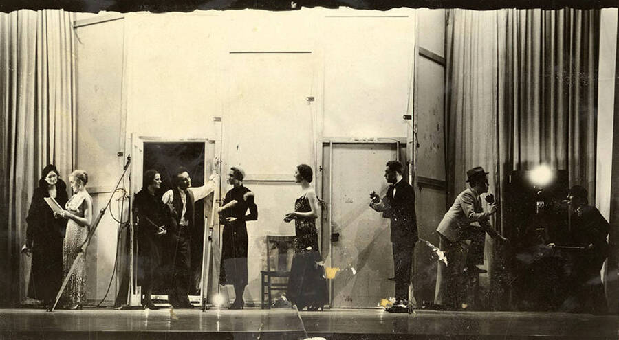 Scene from the University of Idaho drama production of 'Torchbearers.' Members of the cast include Catherine Brandt as Mrs. J. Duro Pampinelli, Grace Eldridge as Mrs. Nelly Fell, Marthalene Tanner as Mrs. Paula Ritter and Leland Cannon as Fred Ritter.