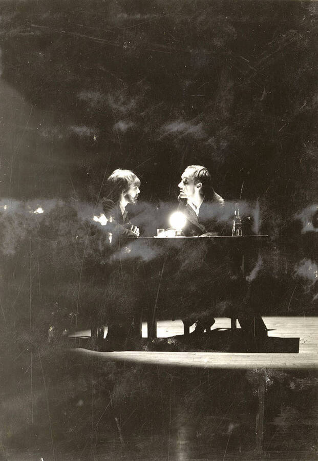 Scene from the University of Idaho drama production of 'The Living Corpse.' This scene is shown as an underworld dive. Cast members include Fred C. Blanchard as Fedya, Ethlyn O'Neal as Lisa, Clayne Robison as Victor, Alberta Bergh Utt as Masha, Raphael Gibbs as Prince Sergius, Erma Lewis as Anna Pavlovna, Casady Taylor as Petrovitch, Earl Bopp as Artimiev, and Joe Paquet as Petushkov.