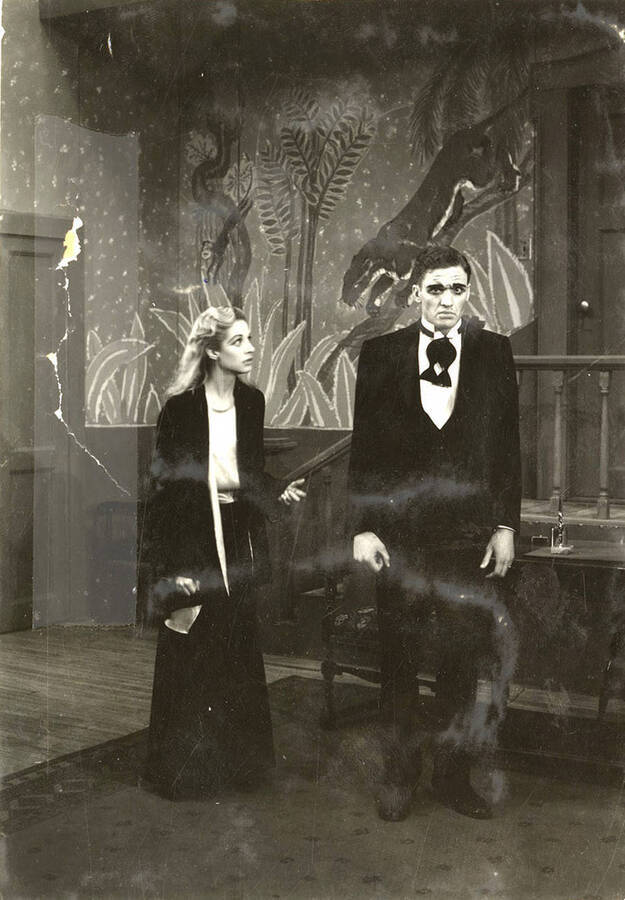 Scene from the University of Idaho drama production of 'Hawk Island.' Members of the cast include Lloyd Ruitel as Paul Cooper, Robert Herrick as Anthony Bryce, Margaret Moulton as Sally Rogers and Alberta Bergh Utt as Madeline Austin.