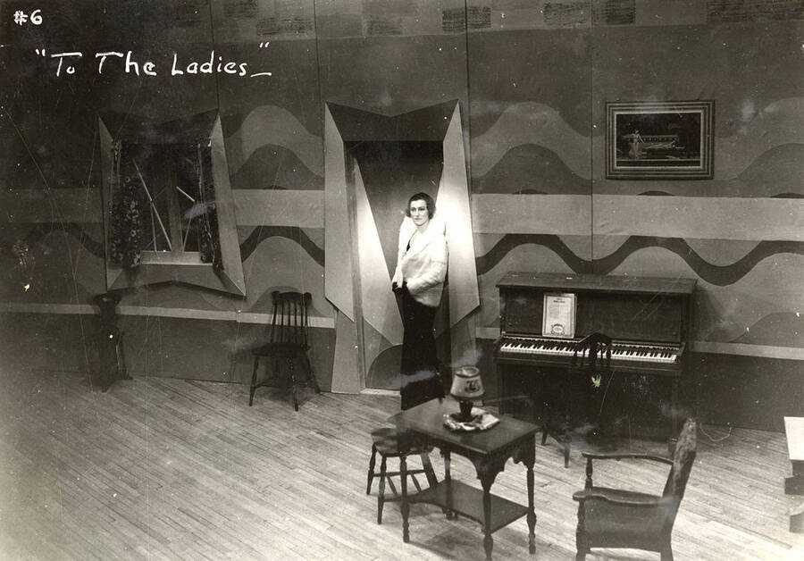 Scene from the University of Idaho drama production of 'To The Ladies.' Members of the cast include John Thomas as Leonard Beebe, Catherine Brandt as Elsie Beebe, Elinor Jacobs as Mrs. Kincaid, Harry Robb as John Kincaid, Howard Altnow, John Milner, Casady Taylor, Rollin Hunter, Franklyn Bovey, Winfred Janssen, Walter Pratt, and Edwin Ostroot.