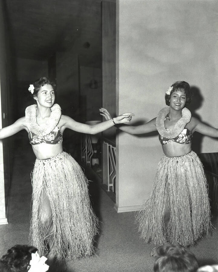 Dianna and Joanne Heller perform Hawaiian dances as part of the entertainment for rush week guests.