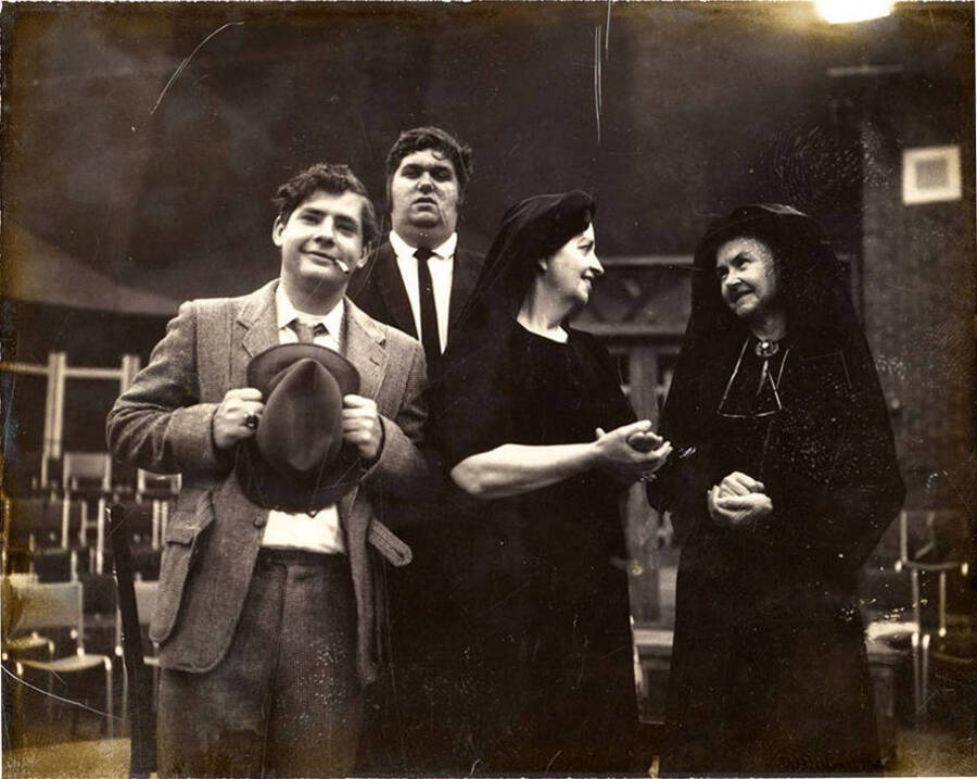 Scene from the University of Idaho drama production of 'Arsenic and Old Lace.' This production was directed by Edmund Chavez. Two women can be seen talking with each other.