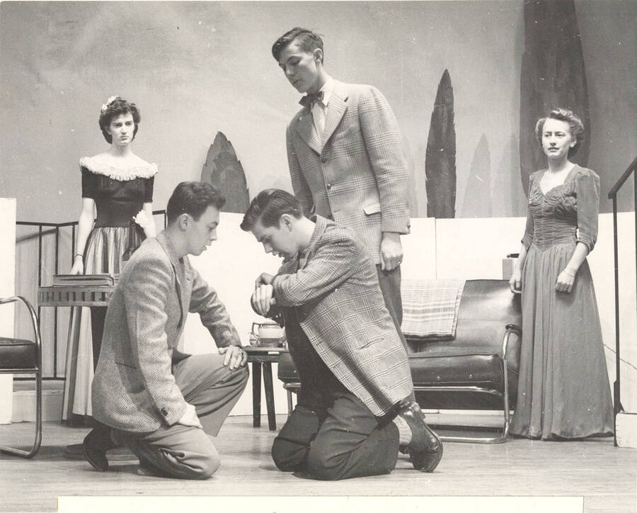 The University of Idaho drama production of 'Hotel Universe.' Ann Smith as Hope Ames, Jack Rowe as Patrick Farley, Orvid Ray Cutler, Jr. as Tom Ames, Louis Casho as Norman Rose, Drexel Brown as Ann Field.