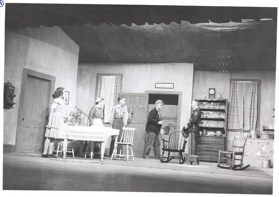 The University of Idaho drama production of 'Papa Is All.' Individuals identified from left to right: Marion Wilson as Emma, Grace Lillard as Mama, Edward Dalva as Jake, William Davidson as Papa, Mike Oswald as State Trooper.