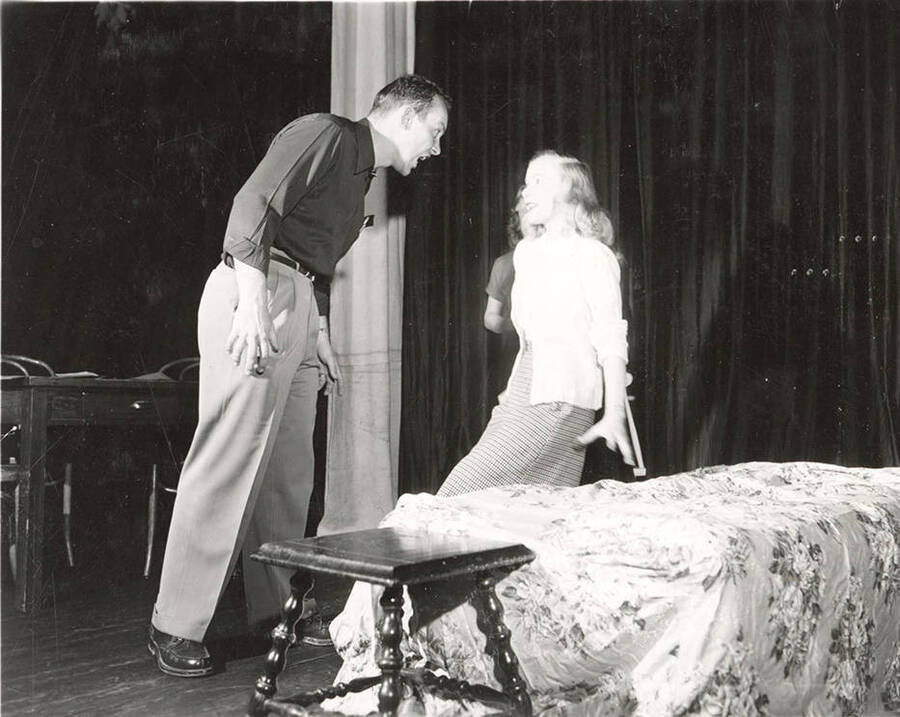Richard Pennell as Tom and Lorraine Cole as Amanda during rehearsal for the University of Idaho drama production of 'The Glass Menagerie.'