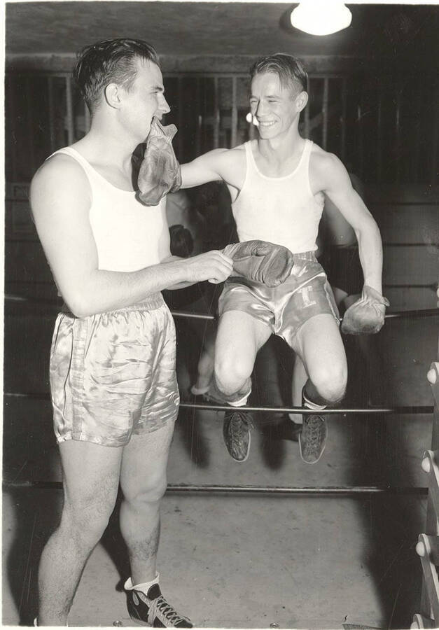 Idaho boxers Richard Therrell and Ralph Miller joke ringside after practice.