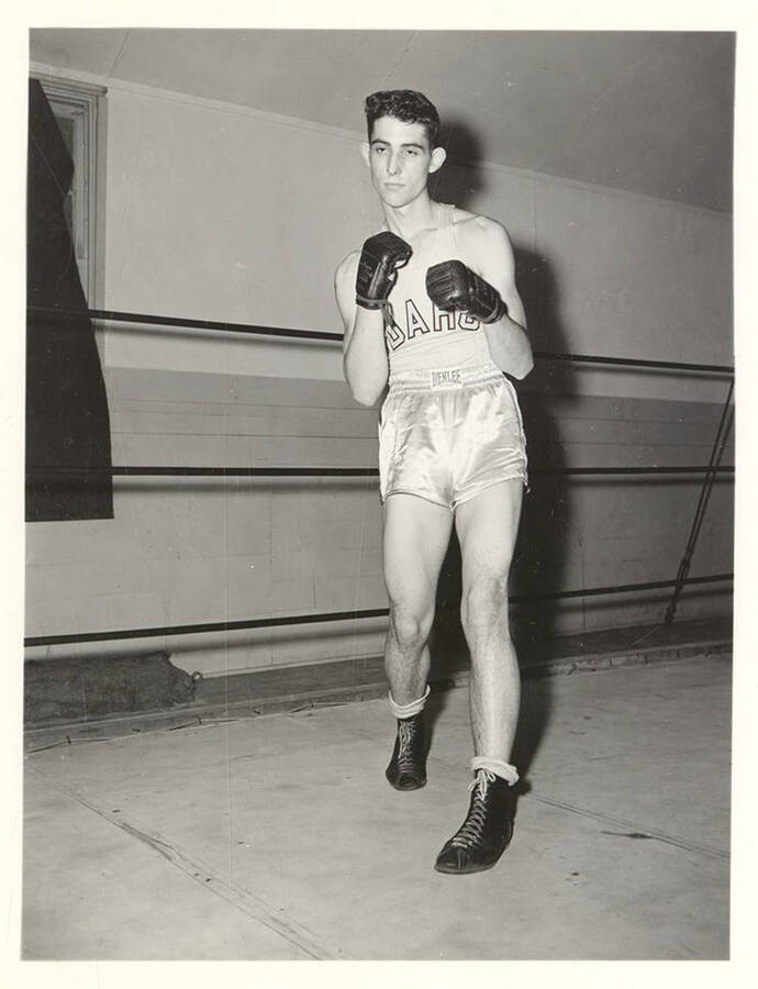 Idaho boxer John Echevarria poses in ready-position for his individual photograph.